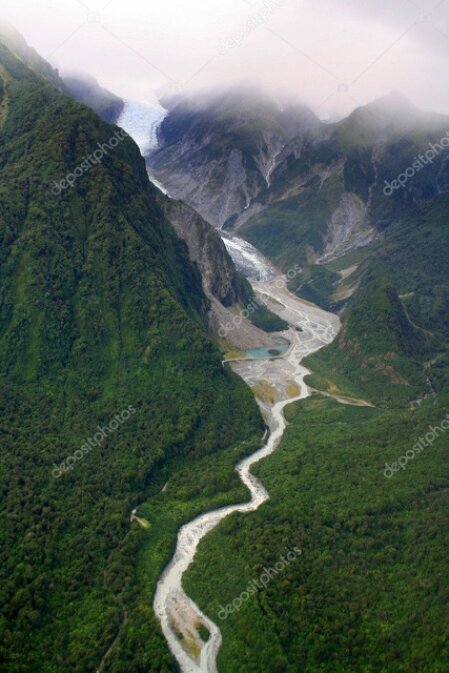 Helicopter beside a remote South Island river
