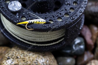 Guide and guest fly fishing on a clear South Island river